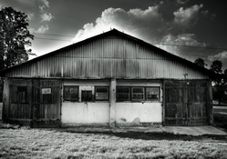 an old hut in monochrome