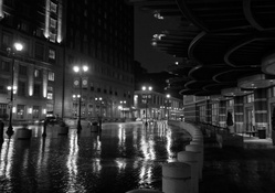 rainy night on a cobblestone street