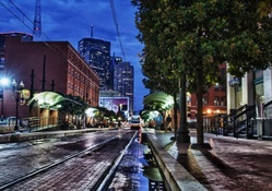 trolley on a dallas street at night hdr