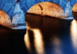 arched stone bridge at night hdr