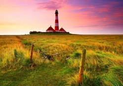 beautiful tall red and white lighthouse