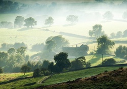 morning fog over a lovely farm
