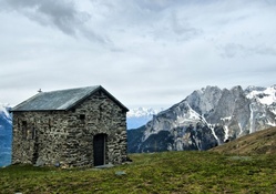 fantastic stone chapel in the mountains