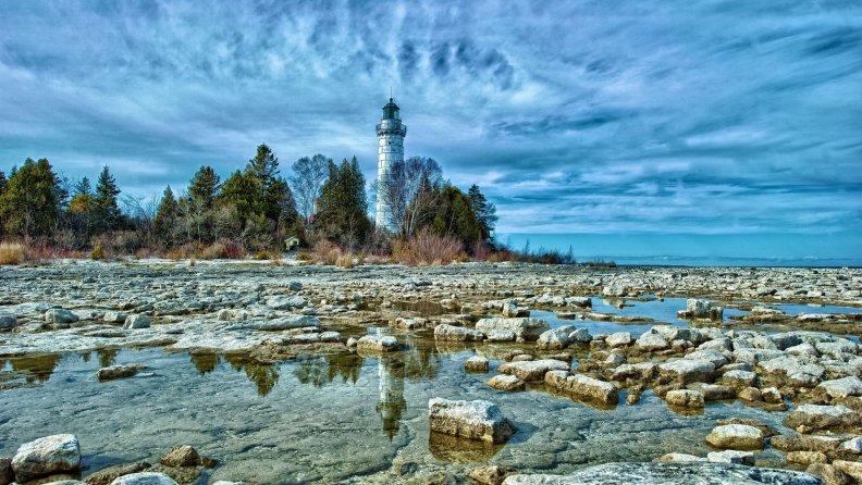 fantastic lighthouse in a forest hdr