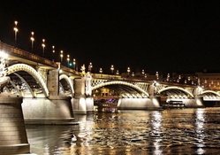 beautiful angled bridge at night