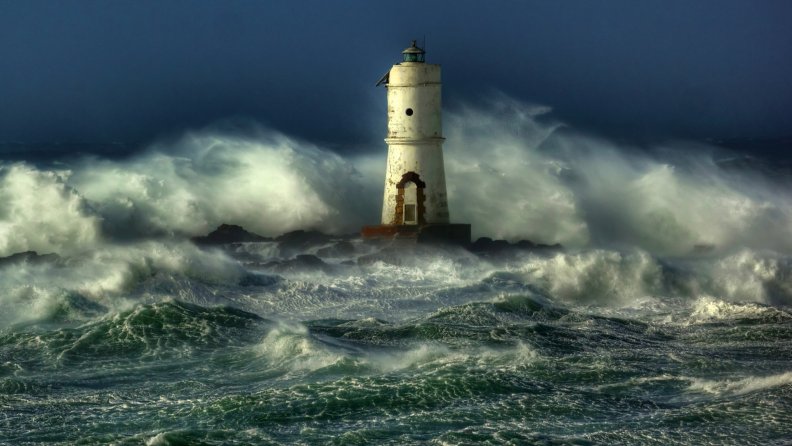 amazing lighthouse in ocean waves
