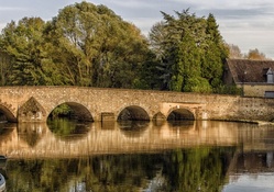 wonderful stone bridge in french countryside