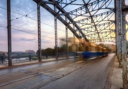tram over bridge in long exposure