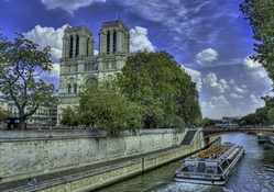 cathedral along a paris river hdr