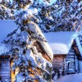 wooden huts in deep winter in alaska hdr