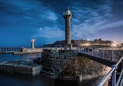 fantastic lighthouses infront of a town on a cliff hdr