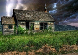 storm over an abandoned cabin hdr