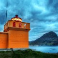 orange lighthouse in iceland hdr