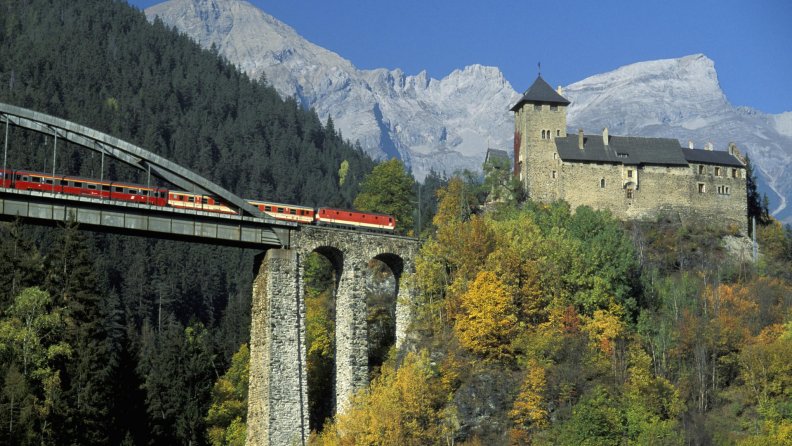 train_bridge_to_a_castle_in_austrian_alps.jpg