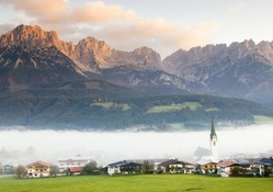 austrian tyrol village in fog