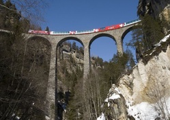 fantastic train bridge in engadin valley swiss alps