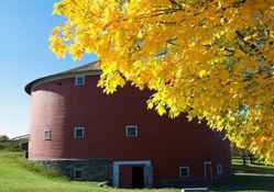 A Round, Red Barn in Autumn