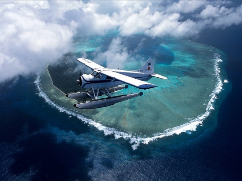 airplane over island 