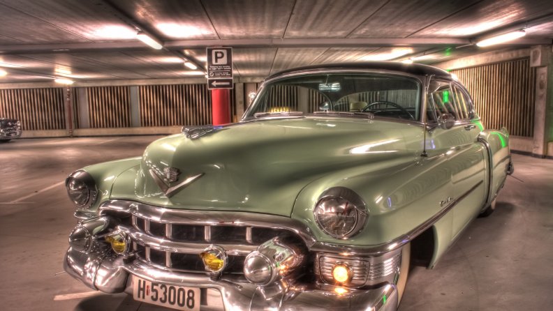 classic cadillac in an underground parking lot hdr