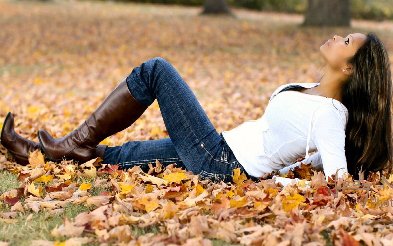 autumn_cowgirl_in_leaves.jpg