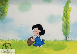 lucy holding pigskin